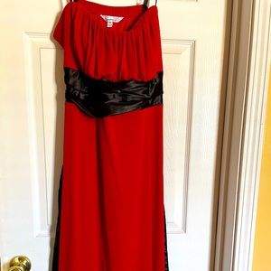 Red with black silk ribbon belted bow.